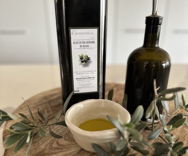 Masseria Rosella olive oil on wooden board